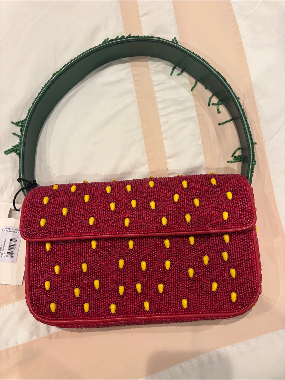 STAUD Red Beaded Shoulder Bag with Yellow Accents and Green Handle